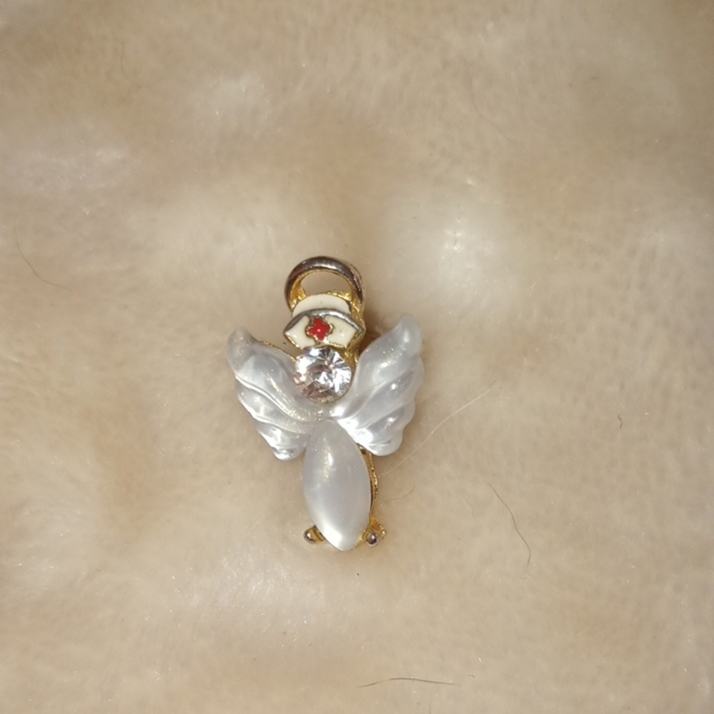 Elegant Gold and White Angel Pendant